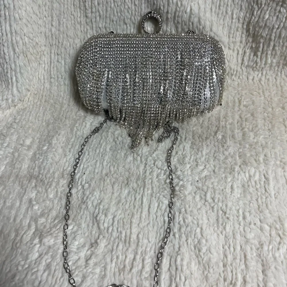 Elegant Silver Clutch with Rhinestone tassels Detailing.